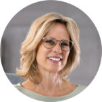 smiling woman with glasses